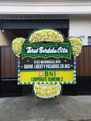 Papan Bunga Duka di Merak