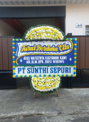 Papan Bunga Duka di Merak