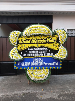 Papan Bunga Duka di Merak