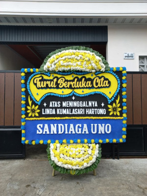 Papan Bunga Duka di Merak