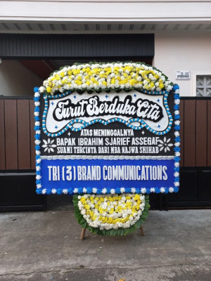 Papan Bunga Duka di Merak